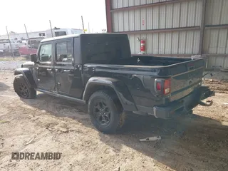 2021 Jeep Gladiator Willys with VIN 1C6HJTAG8ML563161, listed as a IAAI auction lot 40311666 with 48,521 mi miles and . Bid and sale history available at DreamBid. Image 3.