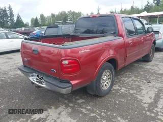 2001 Ford F-150 XLT with VIN 1FTRW08L91KE59120, listed as a IAAI auction lot 42301677 with Not provided miles and . Bid and sale history available at DreamBid. Image 4.
