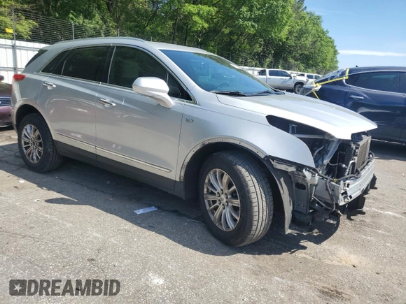 2017 Cadillac XT5 FWD с VIN 1GYKNARS9HZ107327, выставлен на аукционе Copart как лот 56099575 с пробегом 111 718 миль миль и Списание • Salvage title. История ставок и продаж доступна на DreamBid. Изображение 4.