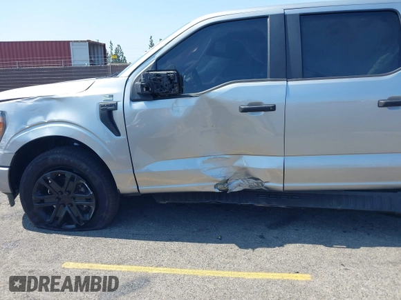 2023 Ford F-150 XL with VIN 1FTEW1CP0PKG14886, listed as a IAAI auction lot 42444367 with 10,677 mi miles and . Bid and sale history available at DreamBid. Image 6.
