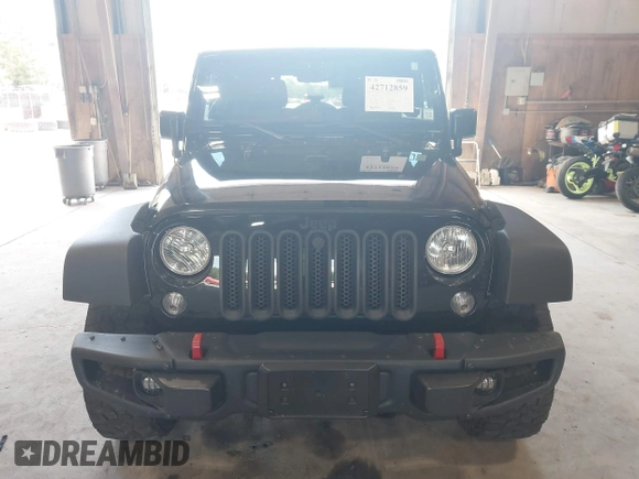 2017 Jeep Wrangler Unlimited Sport with VIN 1C4HJWDG2HL557576, listed as a IAAI auction lot 42712859 with 86,280 mi miles and . Bid and sale history available at DreamBid. Image 6.