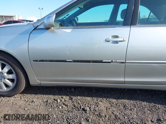 2003 Toyota Camry LE with VIN 4T1BE30K43U227357, listed as a IAAI auction lot 42144237 with 101,135 mi miles and . Bid and sale history available at DreamBid. Image 6.