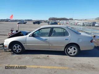 1997 Nissan Altima XE with VIN 1N4BU31D4VC221788, listed as a IAAI auction lot 41356945 with 136,931 mi miles. Bid and sale history available at carsss.com. Image 14.
