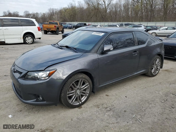 2011 Scion tC with VIN JTKJF5C71B3017022, listed as a Copart auction lot 52859865 with 220,603 mi miles and Salvage Title. Bid and sale history available at carsss.com. Image 1.