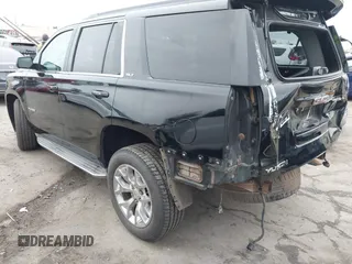 2015 GMC Yukon SLT with VIN 1GKS1BKC3FR129173, listed as a IAAI auction lot 41795585 with 97,893 mi miles. Bid and sale history available at carsss.com. Image 3.