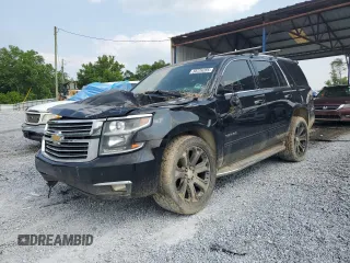 2015 Chevrolet Tahoe LTZ with VIN 1GNSCCKC1FR548254, listed as a Copart auction lot 58726285 with 187,115 mi miles and Salvage title. Bid and sale history available at DreamBid. Image 1.