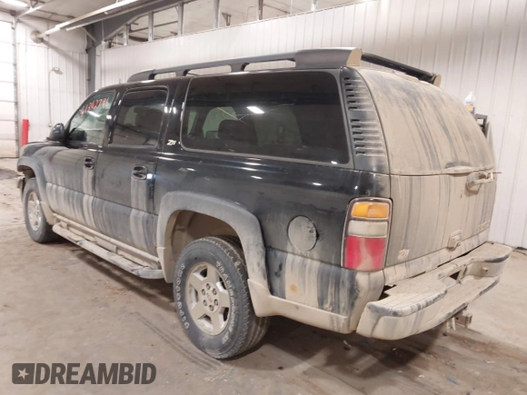 2004 Chevrolet Suburban Z71 with VIN 3GNFK16Z94G148074, listed as a IAAI auction lot 41342796 with 216,670 mi miles. Bid and sale history available at carsss.com. Image 3.