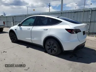 2024 Tesla Model Y Long Range with VIN 7SAYGAEE7RF205700, listed as a Copart auction lot 53814155 with 8,986 mi miles and Salvage Title. Bid and sale history available at DreamBid. Image 2.