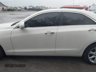2013 Cadillac ATS Performance z VIN 1G6AJ5S38D0145690, wystawiony jako IAAI lot #41517865 z przebiegiem 136 606 mil mil oraz . Historia ofert i sprzedaży dostępna na DreamBid. Obrazek 15.