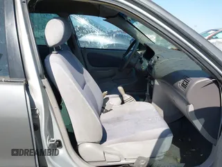 1999 Toyota Corolla VE z VIN 1NXBR12E5XZ237045, wystawiony jako IAAI lot #42413586 z przebiegiem Nie podano mil oraz . Historia ofert i sprzedaży dostępna na DreamBid. Obrazek 5.