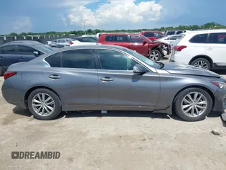 2021 Infiniti Q50 Pure with VIN JN1EV7AP7MM700241, listed as a IAAI auction lot 42586868 with 96,046 mi miles and . Bid and sale history available at DreamBid. Image 13.