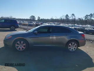 2012 Chrysler 200 Touring with VIN 1C3CCBBG9CN299980, listed as a IAAI auction lot 41689514 with 122,819 mi miles and . Bid and sale history available at carsss.com. Image 14.