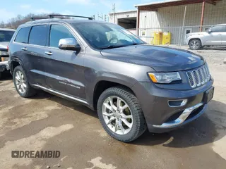 2014 Jeep Grand Cherokee Summit with VIN 1C4RJFJM5EC377129, listed as a IAAI auction lot 41763932 with 187,561 mi miles and . Bid and sale history available at DreamBid. Image 1.