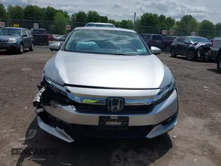 2018 Honda Clarity z VIN JHMZC5F14JC007026, wystawiony jako IAAI lot #42361556 z przebiegiem 74 132 mil mil oraz . Historia ofert i sprzedaży dostępna na DreamBid. Obrazek 12.