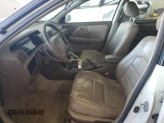 1999 Toyota Camry LE z VIN JT2BG22K3X0317823, wystawiony jako Copart lot #58203965 z przebiegiem 167 587 mil mil oraz Szkoda całkowita • Salvage title. Historia ofert i sprzedaży dostępna na DreamBid. Obrazek 7.