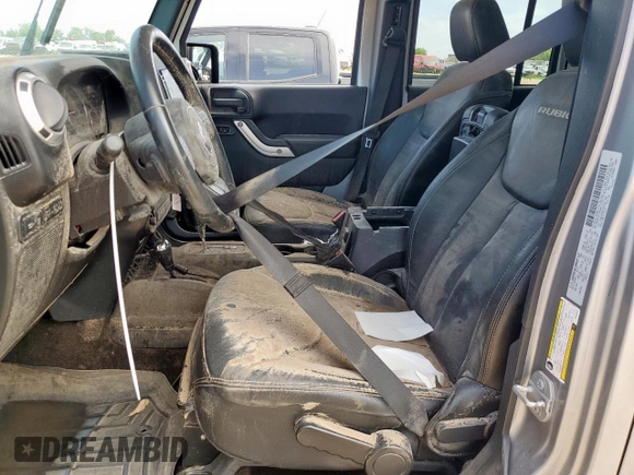 2015 Jeep Wrangler Unlimited Rubicon z VIN 1C4BJWFG0FL529310, wystawiony jako Copart lot #64337405 z przebiegiem Nie podano mil oraz Szkoda całkowita • Salvage title. Historia ofert i sprzedaży dostępna na DreamBid. Obrazek 7.