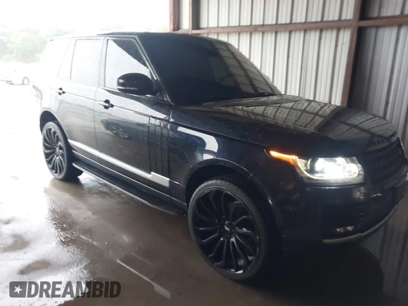 2014 Land Rover Range Rover HSE with VIN SALGS2WF0EA136283, listed as a IAAI auction lot 42161616 with 135,133 mi miles and . Bid and sale history available at DreamBid. Image 1.