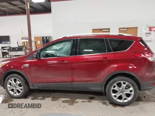 2014 Ford Escape Titanium with VIN 1FMCU9J9XEUA51732, listed as a IAAI auction lot 41542867 with 44,141 mi miles. Bid and sale history available at carsss.com. Image 14.