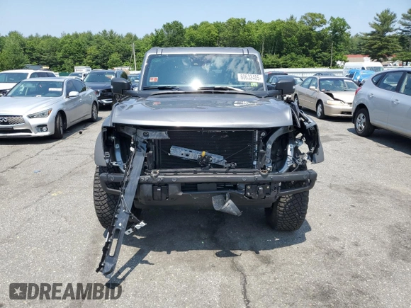 2022 Ford Bronco z VIN 1FMEE5DP6NLB28658, wystawiony jako Copart lot #60632405 z przebiegiem 28 221 mil mil oraz Szkoda całkowita • Salvage title. Historia ofert i sprzedaży dostępna na DreamBid. Obrazek 5.