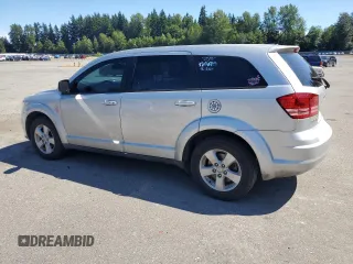 2013 Dodge Journey American Value with VIN 3C4PDCAB3DT650230, listed as a Copart auction lot 63502005 with 139,434 mi miles and Clean title. Bid and sale history available at DreamBid. Image 2.