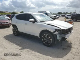 2023 Mazda CX-5 S Premium with VIN JM3KFBDM6P0146078, listed as a Copart auction lot 55654665 with 13,645 mi miles and Salvage Title. Bid and sale history available at DreamBid. Image 4.