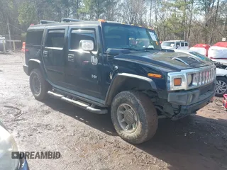 2003 Hummer H2 with VIN 5GRGN23U33H144379, listed as a IAAI auction lot 41452982 with 227,746 mi miles. Bid and sale history available at carsss.com. Image 1.