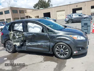 2017 Ford C-Max Titanium z VIN 1FADP5FU9HL103731, wystawiony jako IAAI lot #42244091 z przebiegiem 50 292 mil mil oraz . Historia ofert i sprzedaży dostępna na DreamBid. Obrazek 13.
