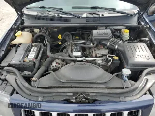2004 Jeep Grand Cherokee Laredo with VIN 1J4GW48S04C125931, listed as a Copart auction lot 59972695 with 198,403 mi miles and Salvage title. Bid and sale history available at DreamBid. Image 12.