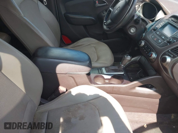 2015 Hyundai Tucson GLS with VIN KM8JT3AF6FU982128, listed as a IAAI auction lot 42227235 with 141,612 mi miles and . Bid and sale history available at DreamBid. Image 5.