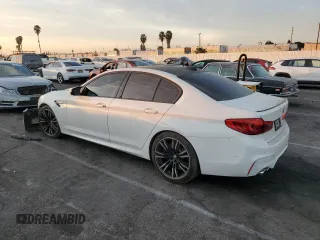 2019 BMW M5 z VIN WBSJF0C53KB284878, wystawiony jako Copart lot #86763564 z przebiegiem Nie podano mil oraz Szkoda całkowita • Salvage title. Historia ofert i sprzedaży dostępna na DreamBid. Obrazek 2.
