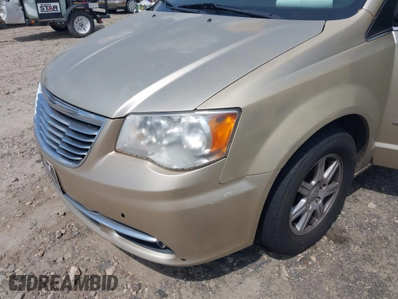 2011 Chrysler Town & Country Touring with VIN 2A4RR5DGXBR613179, listed as a IAAI auction lot 42143355 with 180,906 mi miles and . Bid and sale history available at DreamBid. Image 6.