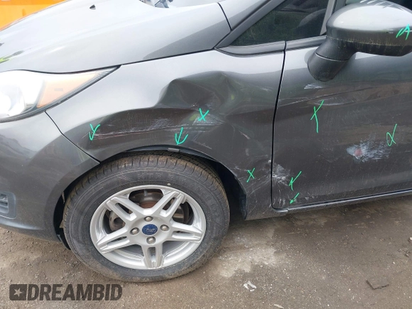 2019 Ford Fiesta SE z VIN 3FADP4BJ7KM155094, wystawiony jako IAAI lot #42186126 z przebiegiem 93 684 mil mil oraz . Historia ofert i sprzedaży dostępna na DreamBid. Obrazek 6.