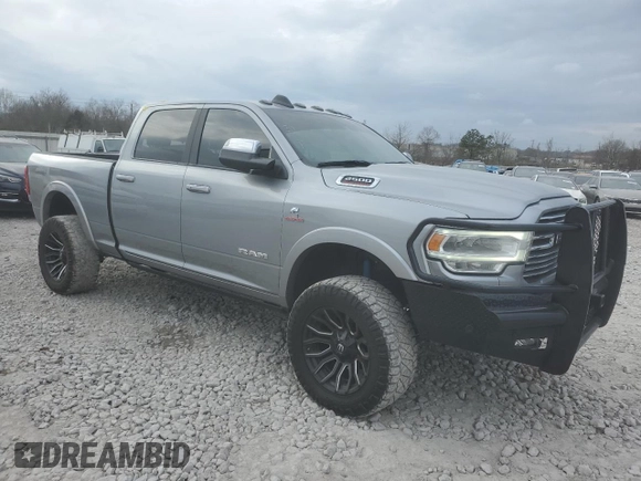 2021 Ram 2500 Laramie with VIN 3C6UR5FL7MG671289, listed as a Copart auction lot 44060965 with 90,716 mi miles and Salvage Title. Bid and sale history available at carsss.com. Image 4.