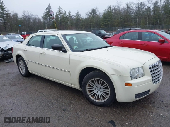 2009 Chrysler 300 LX z VIN 2C3KA43D19H619697, wystawiony jako IAAI lot #41953939 z przebiegiem 146 688 mil mil oraz . Historia ofert i sprzedaży dostępna na DreamBid. Obrazek 1.