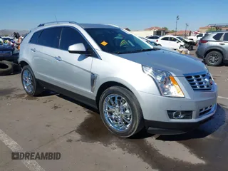 2013 Cadillac SRX Premium Collection z VIN 3GYFNEE36DS556446, wystawiony jako IAAI lot #42289824 z przebiegiem 23 988 mil mil oraz . Historia ofert i sprzedaży dostępna na DreamBid. Obrazek 1.