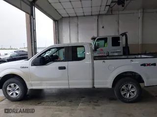 2015 Ford F-150 XLT with VIN 1FTFX1EF7FKD61909, listed as a IAAI auction lot 41957176 with 192,942 mi miles. Bid and sale history available at carsss.com. Image 13.