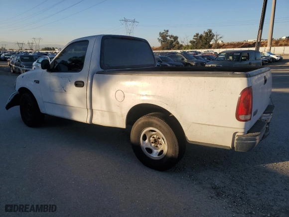 1999 Ford F-150 Work Series with VIN 1FTZF1722XKA39223, listed as a Copart auction lot 77898444 with 0 mi miles and Salvage Title. Bid and sale history available at carsss.com. Image 2.