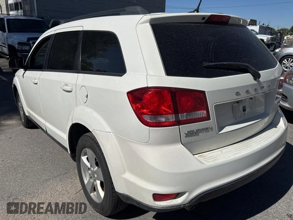 2012 Dodge Journey SXT with VIN 3C4PDDBG6CT249396, listed as a Copart auction lot 74334824 with 158,628 mi miles and Clean title. Bid and sale history available at DreamBid. Image 3.