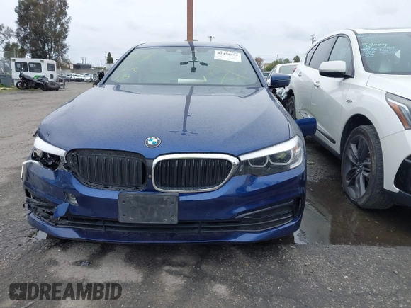 2019 BMW 5 Series 530e iPerformance with VIN WBAJA9C59KB389898, listed as a IAAI auction lot 41479595 with 90,965 mi miles. Bid and sale history available at carsss.com. Image 12.