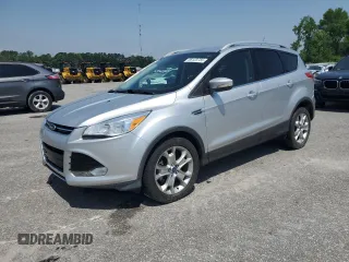 2014 Ford Escape Titanium с VIN 1FMCU0J93EUE21754, выставлен на аукционе Copart как лот 56123755 с пробегом 26 784 миль миль и Списание • Salvage title. История ставок и продаж доступна на DreamBid. Изображение 1.