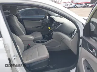 2017 Hyundai Tucson SE with VIN KM8J3CA48HU556569, listed as a IAAI auction lot 41378853 with 67,832 mi miles. Bid and sale history available at carsss.com. Image 5.