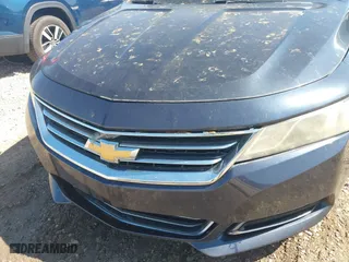 2014 Chevrolet Impala LTZ with VIN 2G1155S31E9254137, listed as a IAAI auction lot 41986102 with 184,296 mi miles. Bid and sale history available at carsss.com. Image 6.