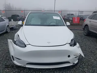 2023 Tesla Model Y Performance z VIN 7SAYGDEF2PF917295, wystawiony jako IAAI lot #41260852 z przebiegiem 23 295 mil mil oraz . Historia ofert i sprzedaży dostępna na DreamBid. Obrazek 12.