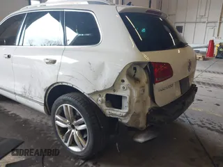 2013 Volkswagen Touareg Lux with VIN WVGEF9BP6DD007323, listed as a IAAI auction lot 41488959 with 123,383 mi miles and . Bid and sale history available at DreamBid. Image 6.