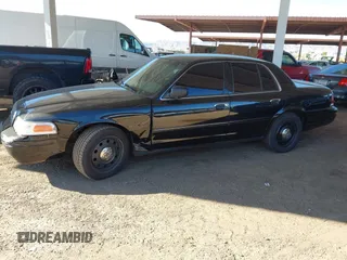 2007 Ford Police Interceptor with VIN 2FAFP71W27X115458, listed as a IAAI auction lot 42566334 with 213,435 mi miles and . Bid and sale history available at DreamBid. Image 17.