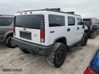 2005 Hummer H2 SUV with VIN 5GRGN23UX5H116341, listed as a Copart auction lot 76877704 with 145,778 mi miles and Salvage Title. Bid and sale history available at carsss.com. Image 3.