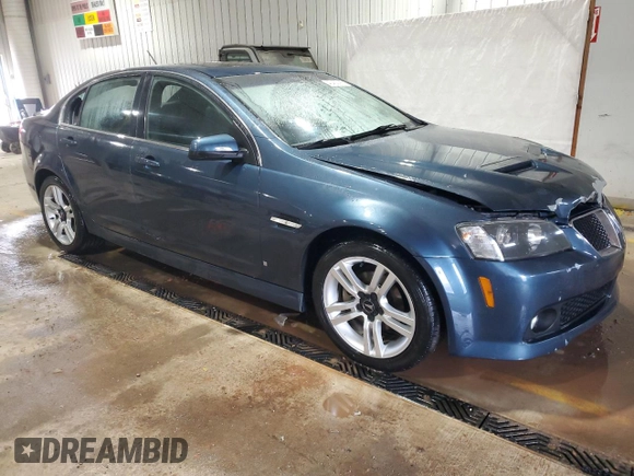 2009 Pontiac G8 with VIN 6G2ER57789L161792, listed as a Copart auction lot 43455795 with 127,236 mi miles and Salvage Title. Bid and sale history available at DreamBid. Image 4.