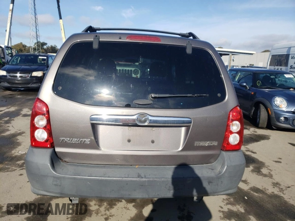 2005 Mazda Tribute i with VIN 4F2YZ02Z55KM21826, listed as a Copart auction lot 85145354 with 204,384 mi miles and Salvage Title. Bid and sale history available at carsss.com. Image 6.