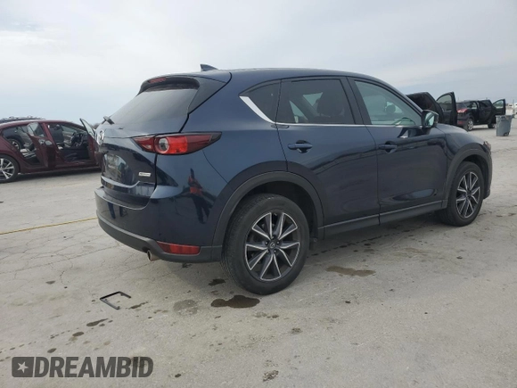 2018 Mazda CX-5 Touring with VIN JM3KFBCM5J0443383, listed as a Copart auction lot 47799095 with 39,814 mi miles and Salvage Title. Bid and sale history available at DreamBid. Image 3.