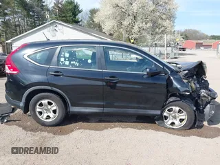 2014 Honda CR-V LX with VIN 2HKRM4H36EH721502, listed as a IAAI auction lot 42070358 with 129,319 mi miles. Bid and sale history available at carsss.com. Image 14.